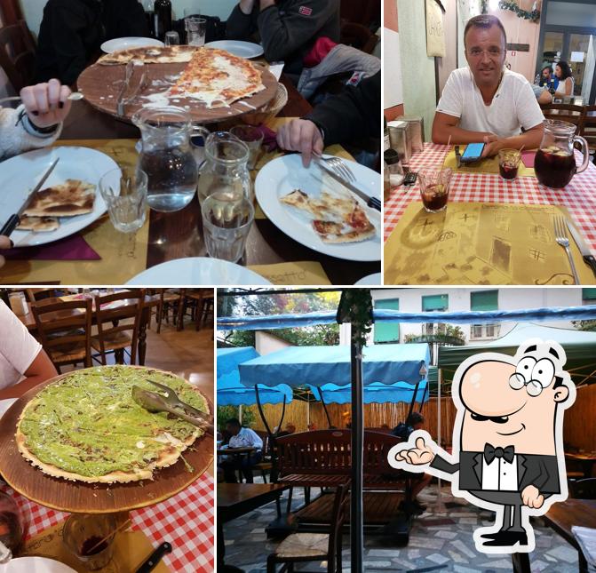 Dai un'occhiata agli interni di Osteria a Ciassetta
