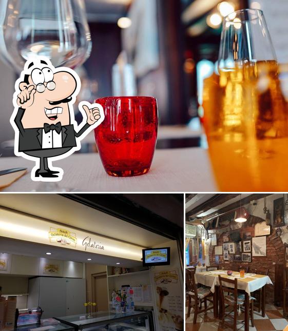 Dai un'occhiata agli interni di Enoteca Venezia