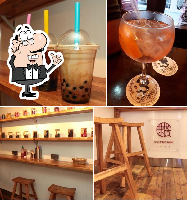 Check out the image displaying interior and drink at Jianbing Bar