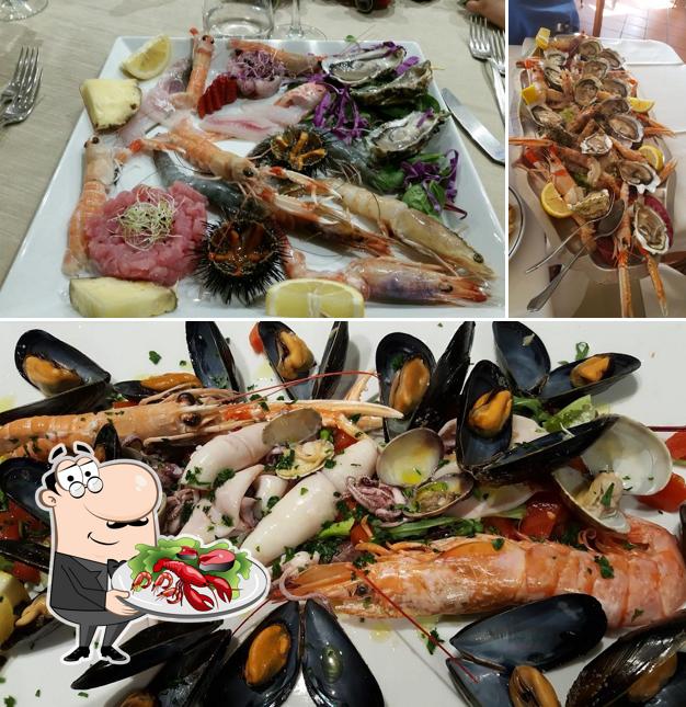 Goditi i sapori della cucina di mare a Ristorante Il Ghignante