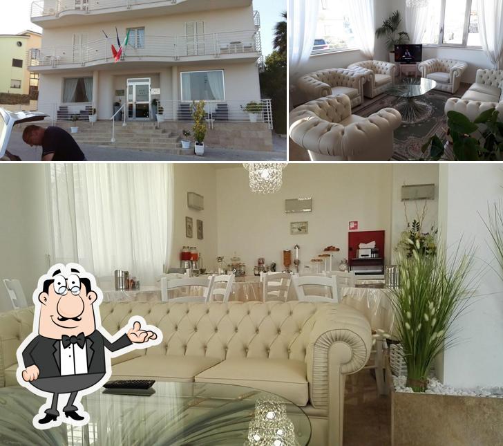 Siediti a un tavolo di Hotel Di Nardo