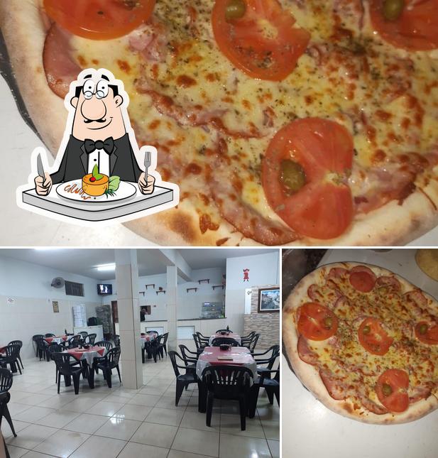 A foto do Pizzaria Tomate Gourmet’s comida e interior