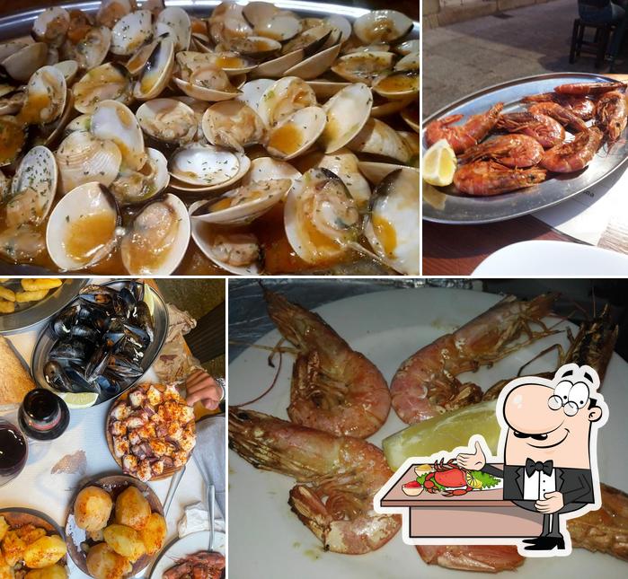Закажите блюда с морепродуктами в "A Taberna do Abrente"