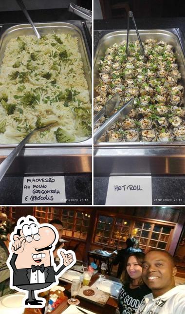 O interior do D'guste Bistro e Pizzaria