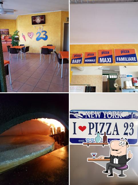 Dai un'occhiata agli interni di Pizza 23