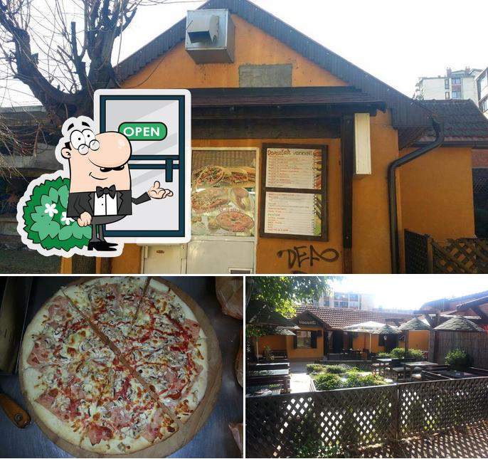 Посмотрите на этот снимок, где видны внешнее оформление и пицца в Pizzeria "Vanelli"