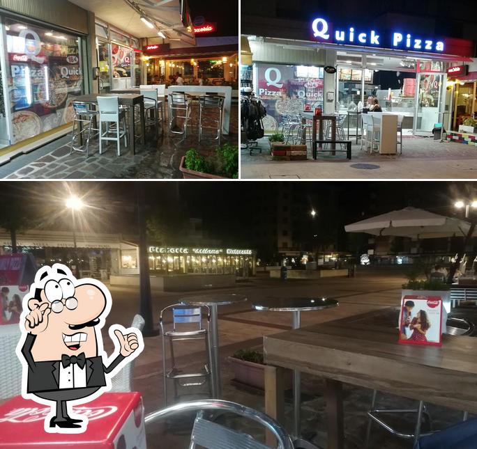 Siediti a un tavolo di Quick Pizza