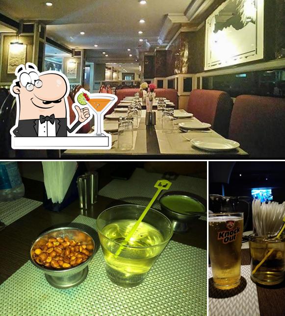 Take a look at the photo showing drink and interior at Golden Dragon