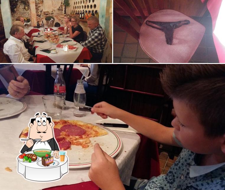 L’image de la table à manger et intérieur de Bella Italia Pizzeria’s