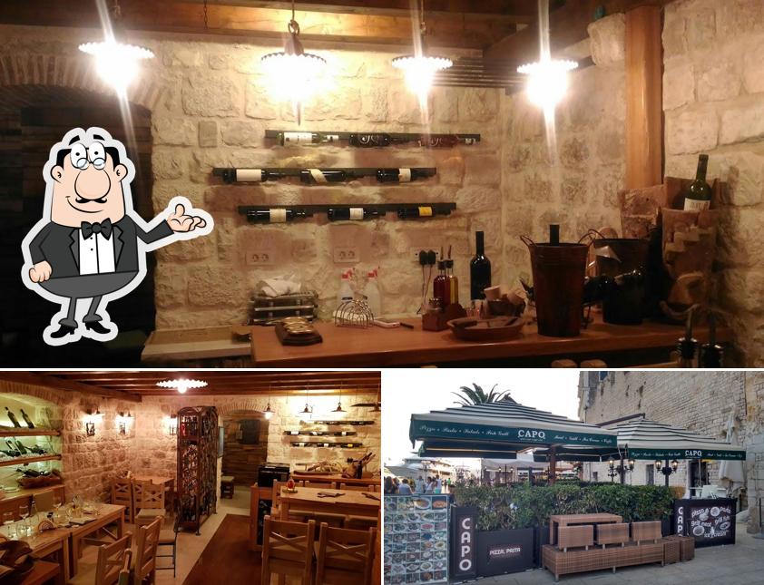 Siediti a un tavolo di Restoran Capo