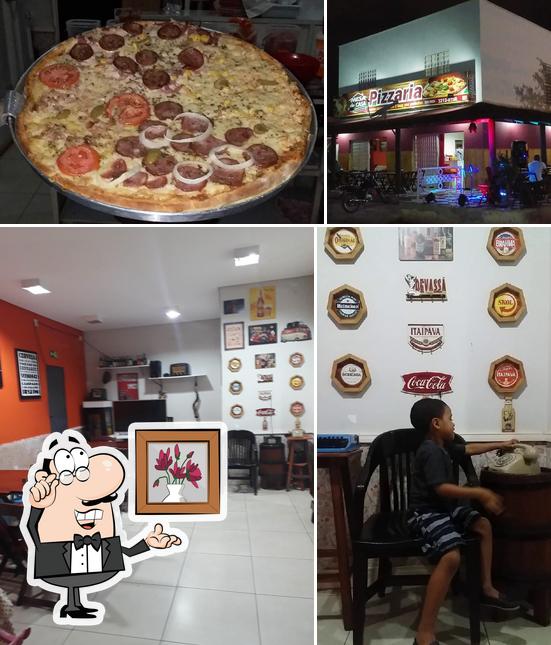 A imagem da interior e comida a Pizzaria do Pixunxa