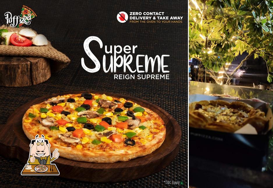 Get pizza at XOXO CAFE