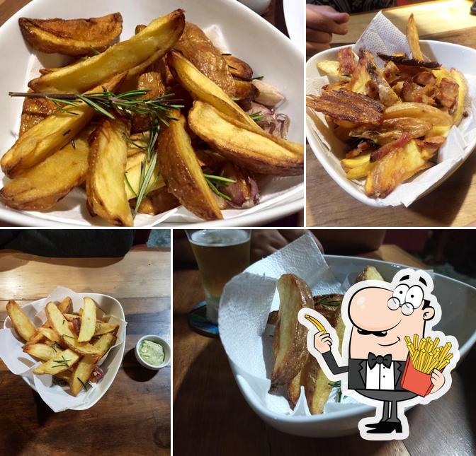 Prove batatas fritas no il Macellaio Hamburgueria Artesanal