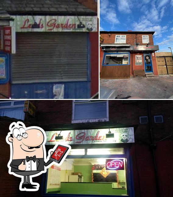 Check out the image depicting exterior and interior at Leeds Garden Chinese Takeaway