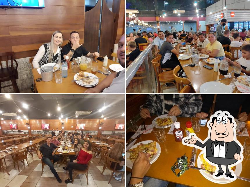 O interior do Cia do Sabor Pizzaria e Rodízio
