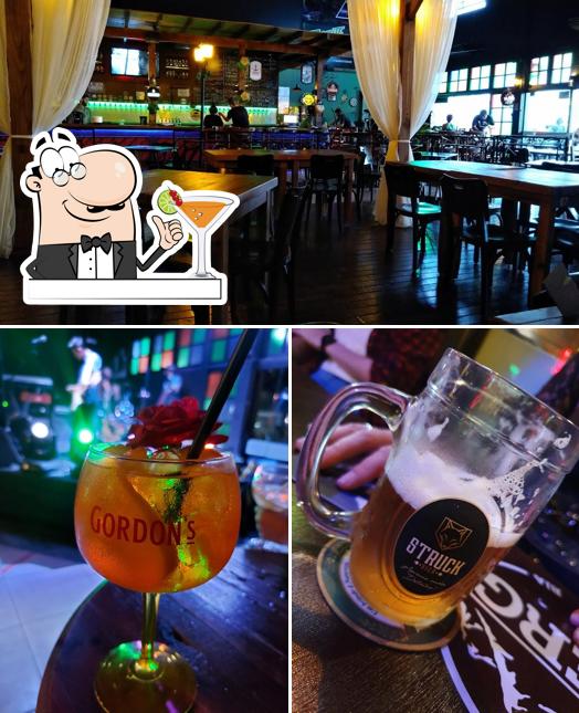 Esta é a ilustração ilustrando bebida e interior no Villa Europa Pub
