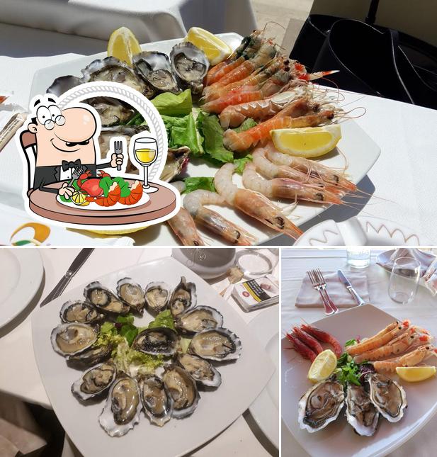 Попробуйте блюда с морепродуктами в "Il Pesce in Bottiglia"