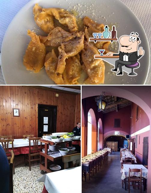 La immagine di interni e cibo da Ristorante Osteria al Ponte