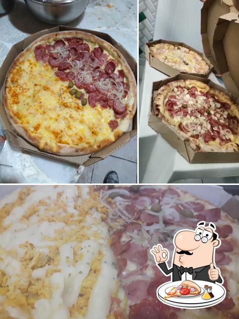 Peça pizza no Pizzaria Tropical Forno à Lenha