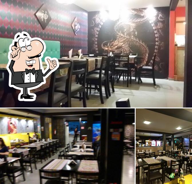 O interior do NERO'S PIZZARIA & CHOPERIA