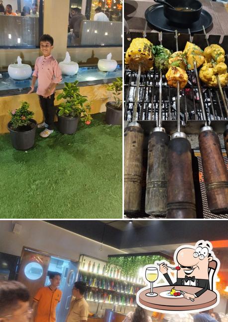 The picture of food and interior at Mad Over Grills Veraval