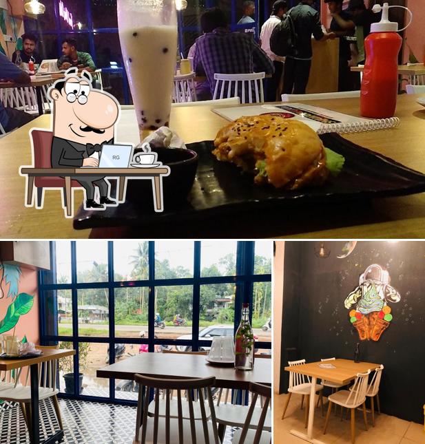 Take a seat at one of the tables at Shawarmax cafe