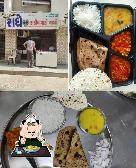 The photo of food and interior at RADHE KATHIYAWADI THALI
