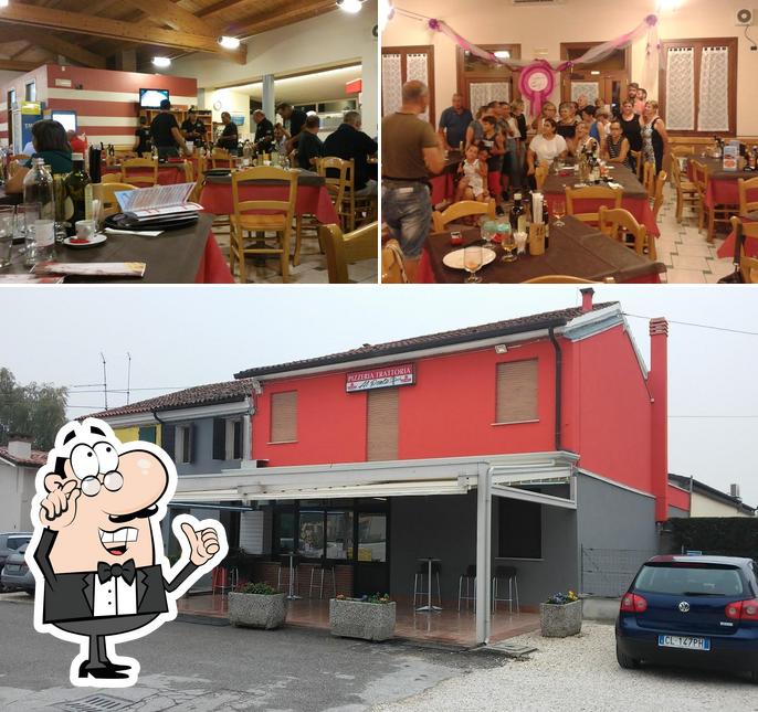 Guarda la foto che raffigura la interni e esterno di Trattoria Pizzeria Al Ponte