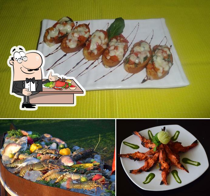Try out seafood at FLAME Poolside Grill