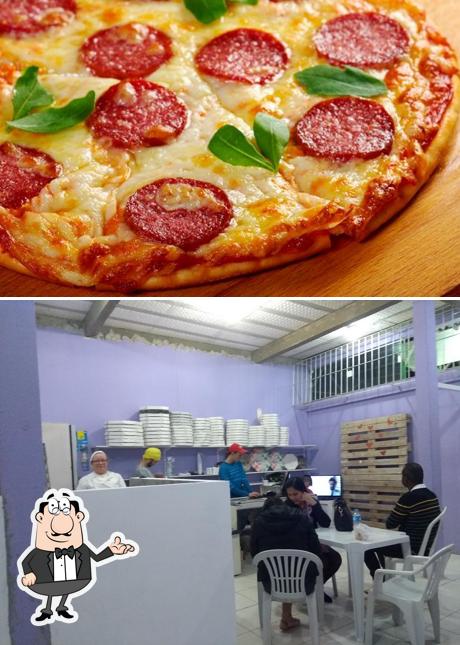 O interior do Pizza da Casa