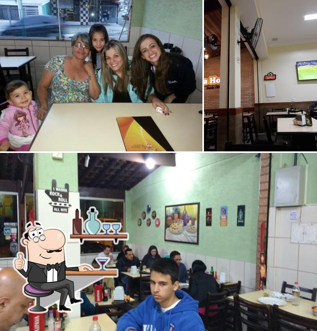 O interior do Pizzaria da Hora