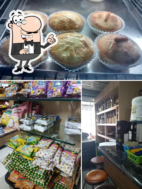 A imagem da interior e comida no Aracy Pan Panificadora Lanchonete e Confeitaria LTDA