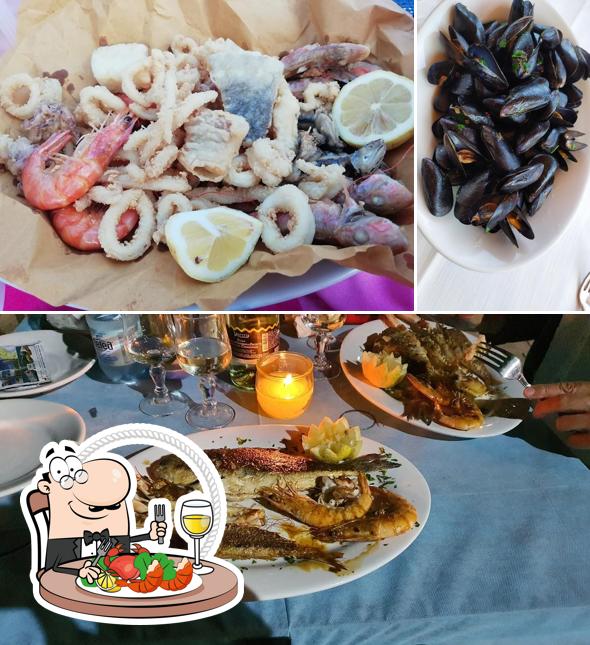 Bestellt verschiedene Meeresfrüchte, die von Ristorante Il Gabbiano angeboten werden