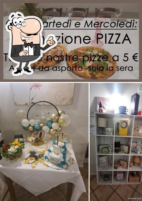 Siediti a un tavolo di L'Opera Prima Ristorante Pizzeria