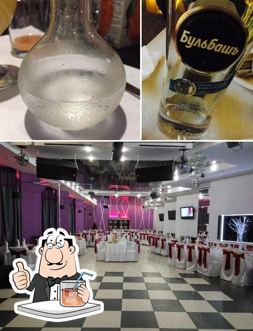 The photo of drink and interior at Ресторан-клуб "Andre"