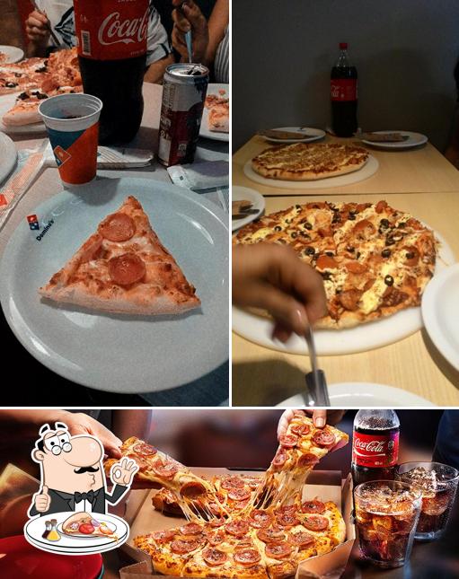 Escolha pizza no Domino's Pizza