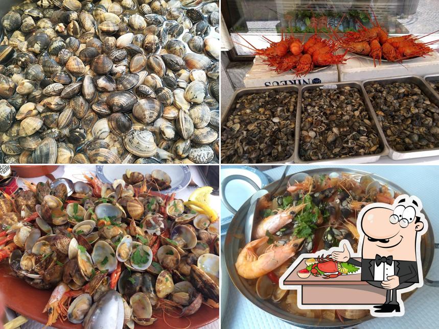 Гости "Restaurante Ala-Riba" могут заказать разные блюда из морепродуктов