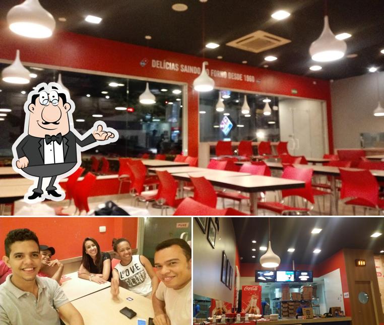Sente em uma das mesas no Domino's Pizza - Teresina