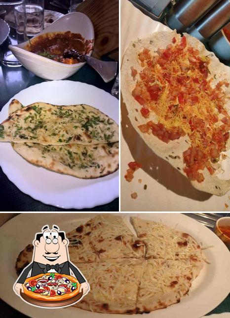 Try out pizza at Maharaja Restaurant Andheri