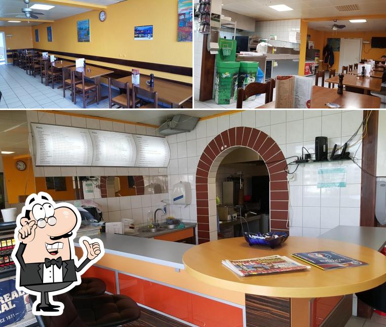 Dai un'occhiata agli interni di Mario's Pizzakurier