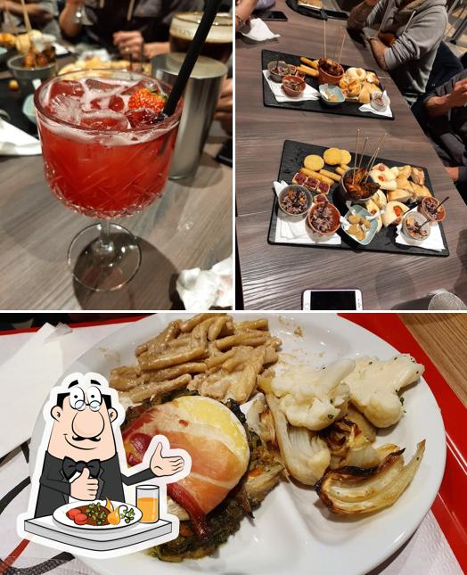 Questa è la immagine che mostra la cibo e alcol di Top Gourmet Erba