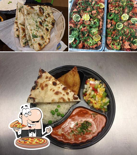 Get pizza at Veda Indian Cuisine