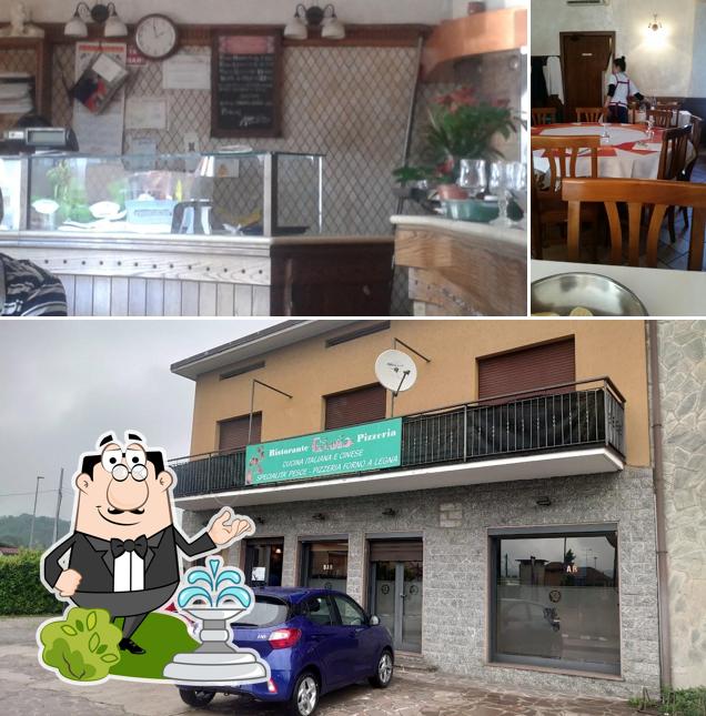 Among various things one can find exterior and dining table at Ristorante Gioia di Hu Ruifa