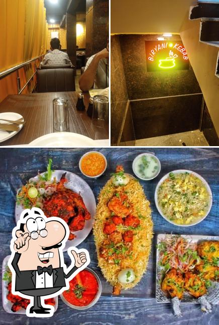 This is the image showing interior and food at Mehfil Restaurant