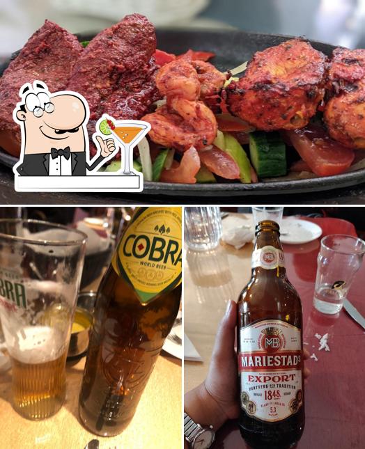 Check out the image showing drink and meat at India Dream