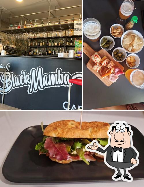 La immagine della interni e cibo di Black mamba bar