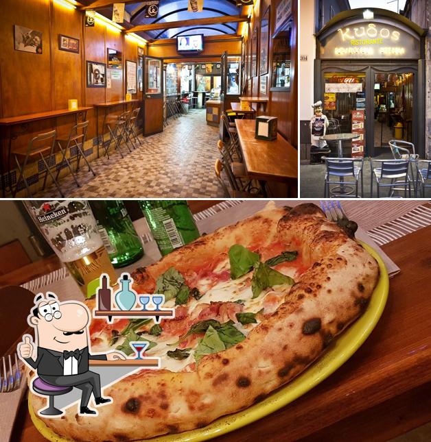 La foto di interni e pizza da Kudos Rosticceria Birreria