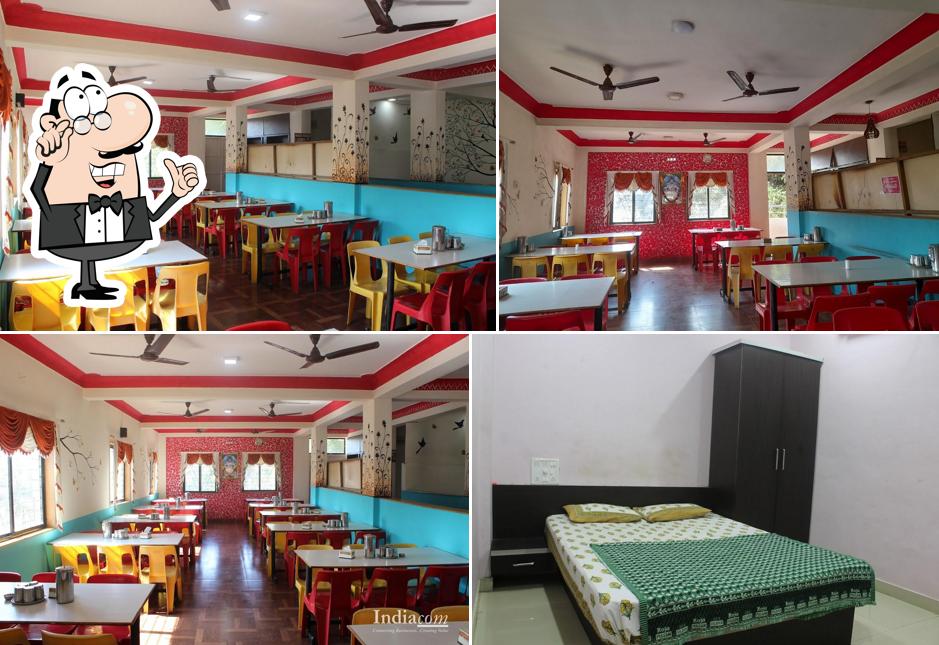 Take a seat at one of the tables at Chintamani Pure Veg