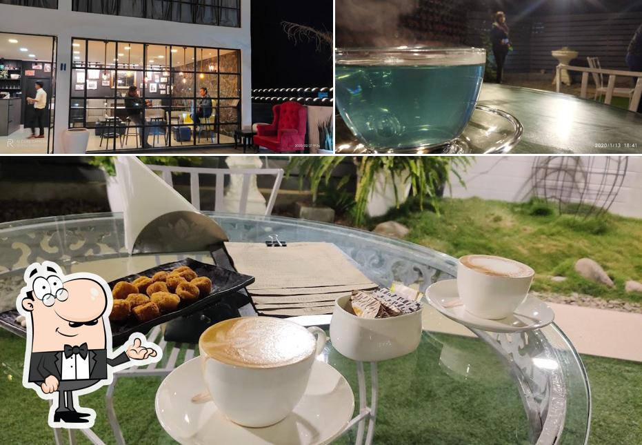 Take a seat at one of the tables at The Vine - Coffee Shop