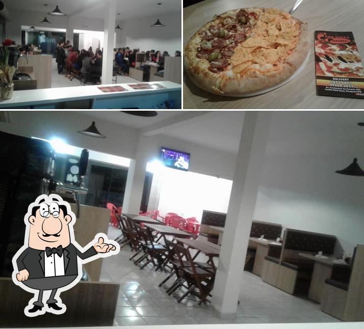 A foto da interior e pizza a Péde Pizza Piraquara